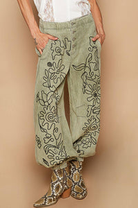Floral embroidered pattern solid twill pants
