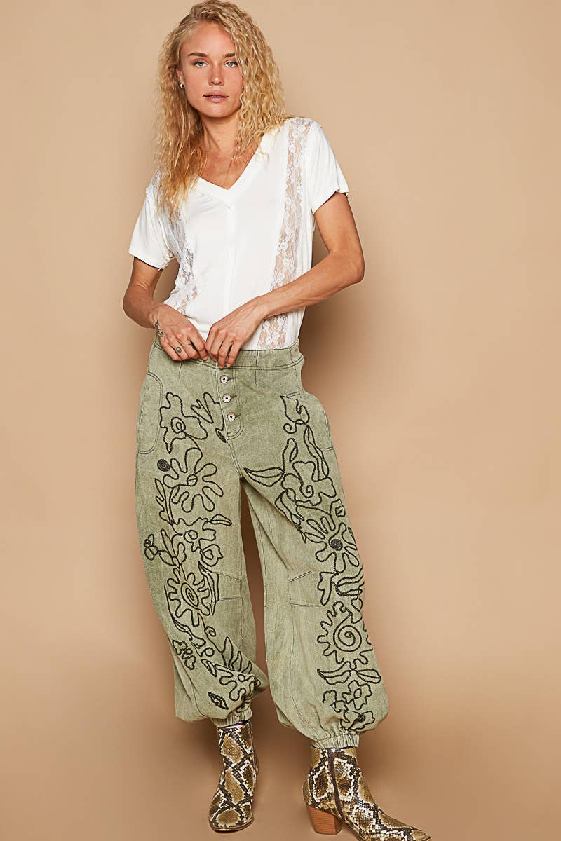 Floral embroidered pattern solid twill pants