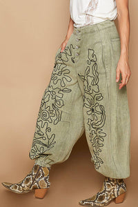 Floral embroidered pattern solid twill pants